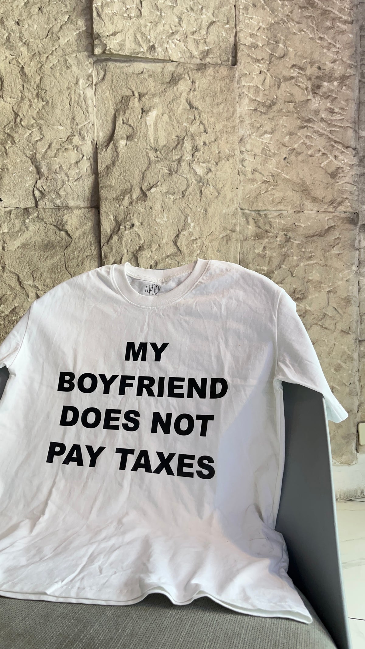 Duvachon MY BOYFRIEND DOES NOT PAY TAXES tee, white, flat lay